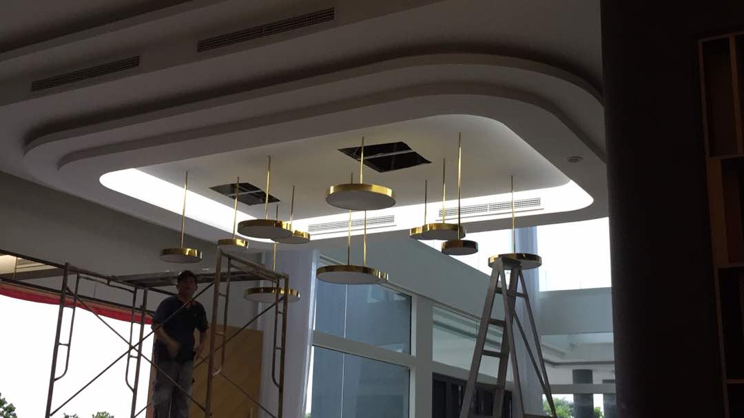 Brass disc pendants — installation