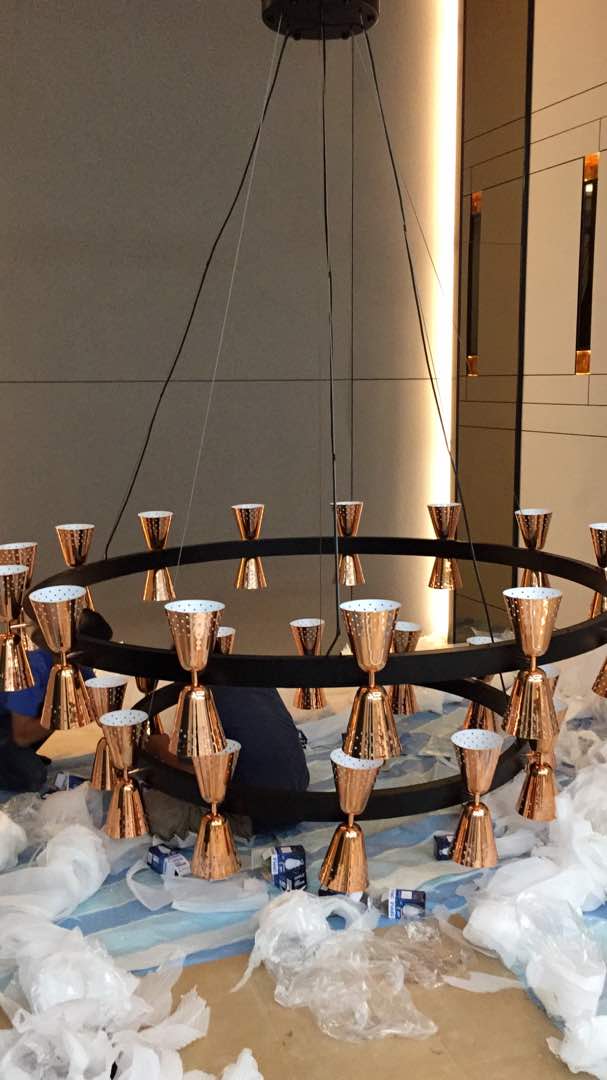 Chandelier assembly on site