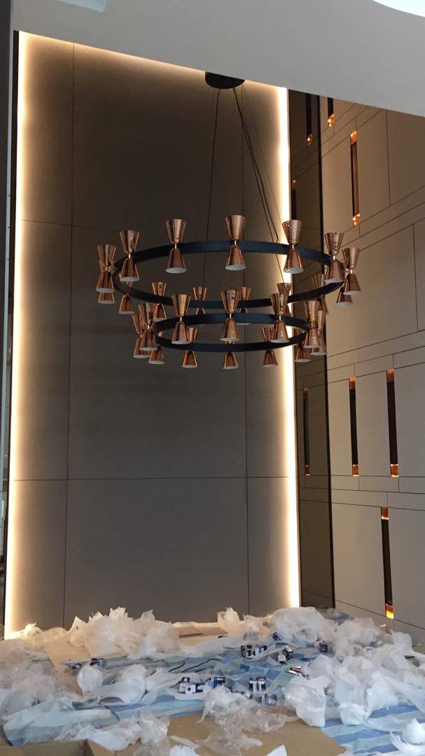 Chandelier hoisted into position